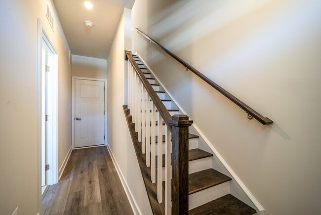 Photo - This 3-bedroom, 3-full bathroom townhouse offers a pristine and contemporary living experience.