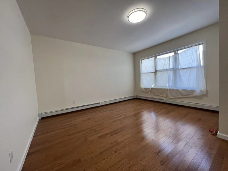 Building Photo - 8693 15th Ave