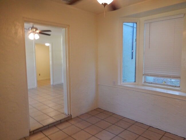 Building Photo - CUTE 2/1 House w/ Huge Yard, Tile Floors Throughout, Office, & Large Storage Room! Available NOW ...