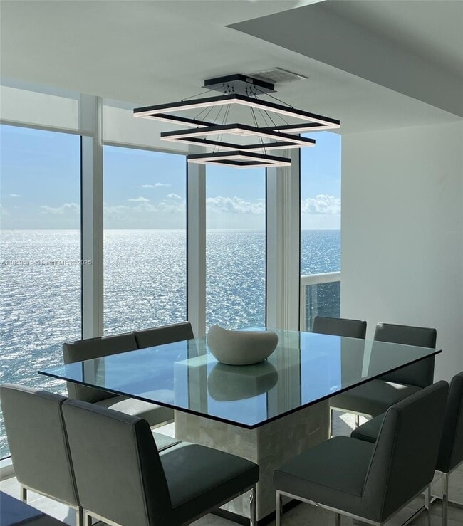 Building Photo - 10275 Collins Ave