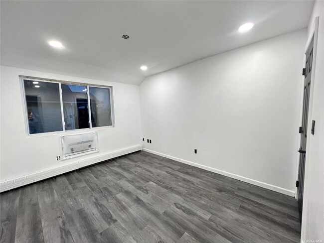 Building Photo - 68-04 Beach Channel Dr