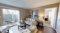This well-appointed one-bedroom, one-bathroom residence in Bay City, Texas offers a practical and comfortable single-floor layout. Rich hardwood-style flooring flows throughout the main living areas, tying together a cohesive and inviting aesthetic defined by warm neutral tones and clean white trim.

The living room is a bright, welcoming space anchored by a sliding glass door that opens to a private outdoor patio, allowing natural light to fill the room and providing convenient outdoor access. Adjacent to the living room, the dedicated dining area provides ample space for a full dining set and features consistent flooring and neutral wall tones.

The galley-style kitchen is efficiently designed with dark cabinetry, granite-style countertops, a double stainless steel sink, and a full suite of appliances including a refrigerator, range, and dishwasher. Overhead cabinetry maximizes storage throughout.

The bedroom is a comfortably sized retreat with plush carpet, a ceiling fan, and a window offering outdoor views and natural light. A dedicated closet provides organized storage. The full bathroom includes a tub-shower combination with tiled surround, a dark-cabineted vanity with granite-style countertop, and hardwood-style flooring, completing this functional and well-finished home.