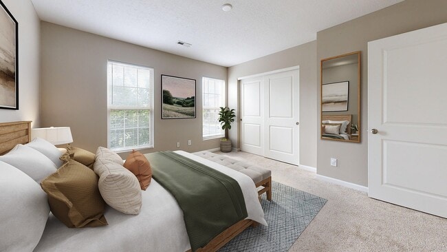 Dormitorio espacioso con grandes ventanas. - Riverford Crossing Apartments