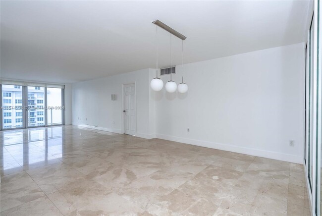Building Photo - 5701 Collins Ave