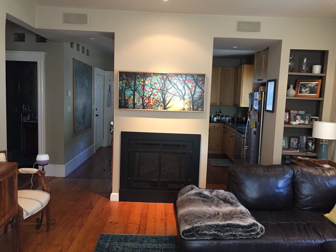 Living room with gas fireplace. - 31 Conway St