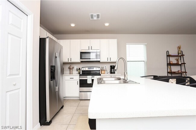 Foto del edificio - 15026 Wildflower Cir