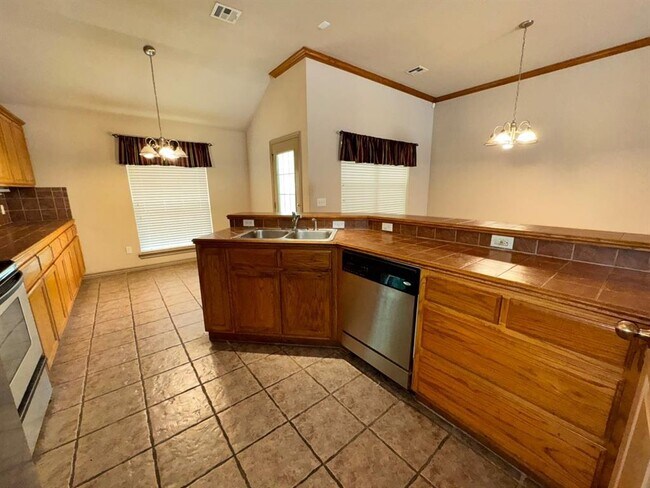 Foto del edificio - 1424 Teakwood Dr