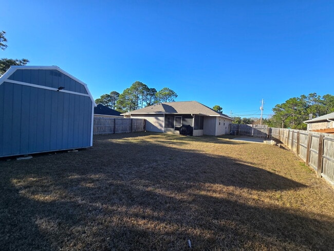Fenced Back Yard, 30 foot RV or Boat Pad - 6661 Water St