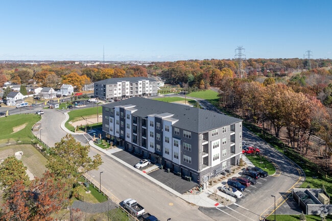 Building Photo - Camelot on Main Street - Brand New!