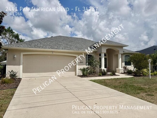 Building Photo - 2441 Pan American Blvd