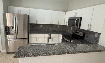 Building Photo - 7655 NW 116th Ave