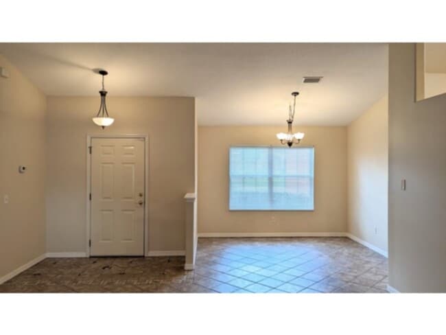 Building Photo - Check this one out!  Open Split Spacious House in Palm Coast, FL!