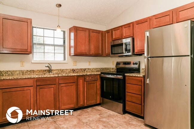 Building Photo - 4002 Harmony Dr