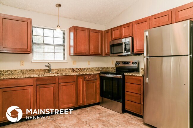 Foto del edificio - 4002 Harmony Dr