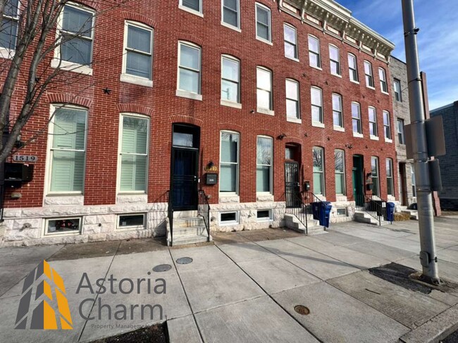Building Photo - Beautifully Renovated 3BR Rowhome Near Johns Hopkins – Gated Parking + Modern Upgrades