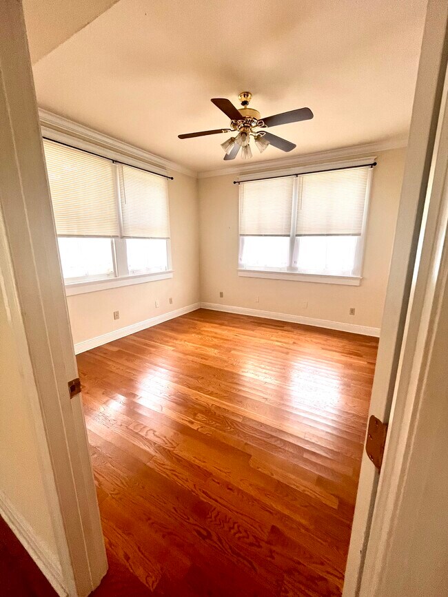 Bedroom 1 (includes walk-in closet); pic is of downstairs unit but identical layout - 2900 Palmer Ave