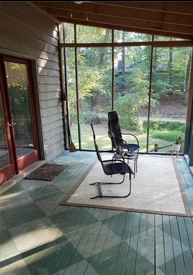 Screened in back porch. - 12010 Rock Canyon Dr