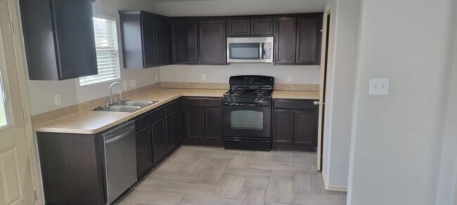 Foto del edificio - 5518 Rustling Gates Ln