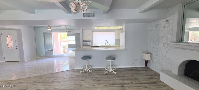 Building Photo - 6116 E Charter Oak Rd