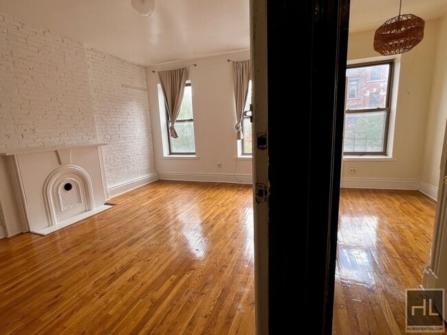 Building Photo - 4BR 1BA Turn Of The Century Floor Through Fulton St. Shophouse Brownstone w/ Bonus Room