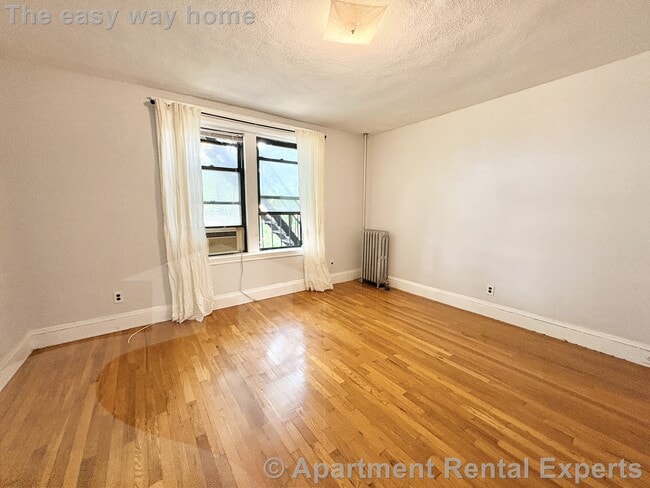 Building Photo - 335A Harvard St Unit #12