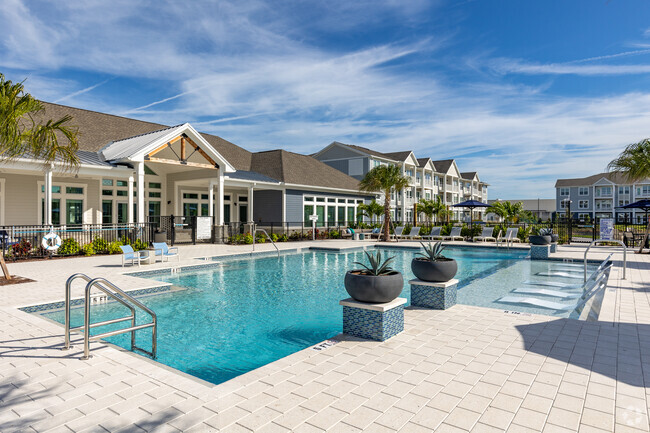 Piscina con estilo de centro turístico - The Pointe at Palm Bay