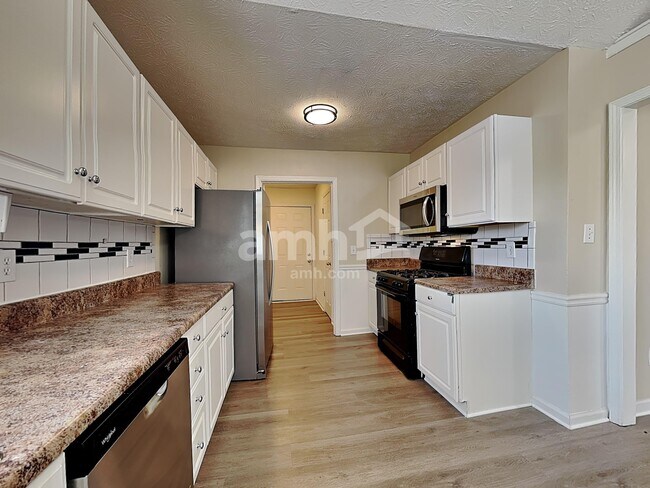 Foto del edificio - 2880 Camelot Woods Dr