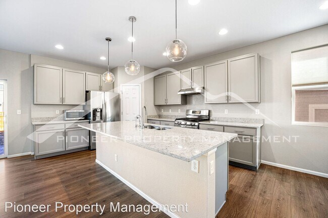 Building Photo - 4 br, 3 bath House - 19141 E. 65th Ave