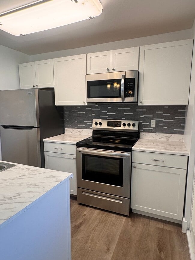 Foto del edificio - Charming 2 Bedroom with Garage  … (flexibl...