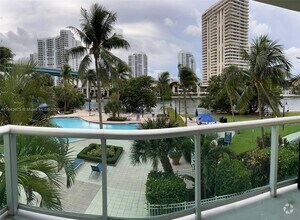 Building Photo - 19390 Collins Ave