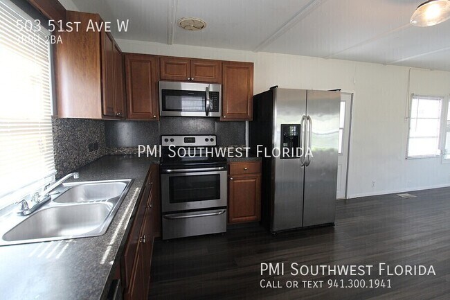 Building Photo - 503 51st Ave W