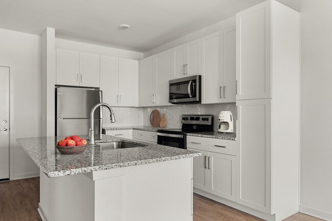 Experience the elegance of a modern kitchen designed for style and functionality. - The Rosery