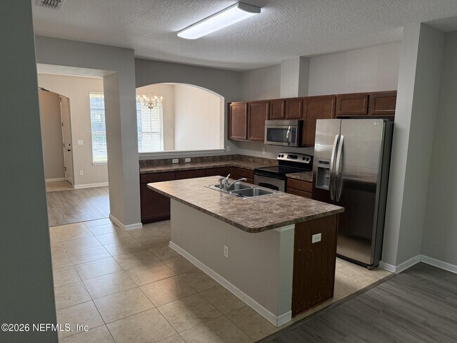 Foto del edificio - 4220 Plantation Oaks Blvd