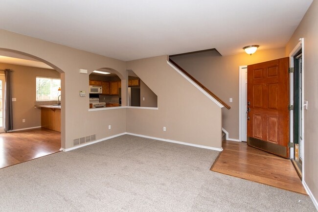 Building Photo - Exceptional 4-Bedroom Home with Cozy Firep...