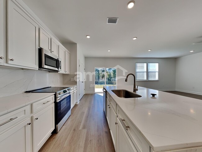 Foto del edificio - 313 Calla Lily Ct