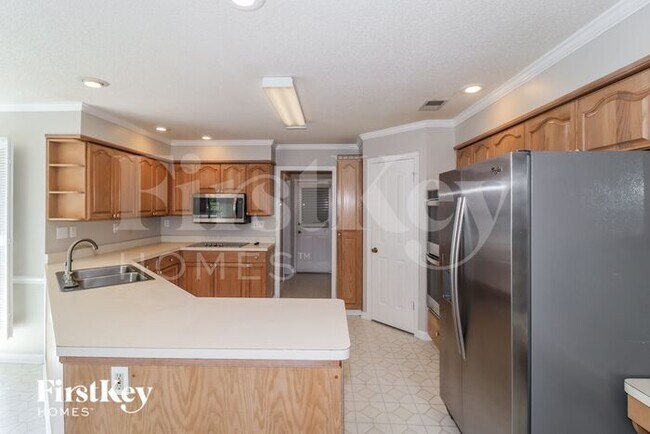 Foto del edificio - 8410 Walnut Tree Dr