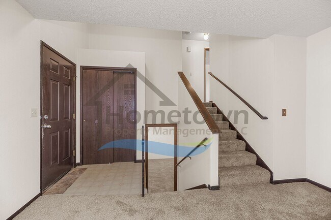 Building Photo - 3 Bedroom 2 Bathroom Home with Attached Ga...