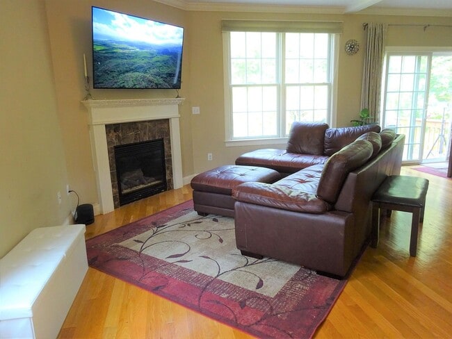 Living Room with Fireplace - 24 Autumn Ln