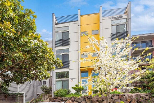 Building Photo - 2218B Yale Ave E - 2 bedrooms + den