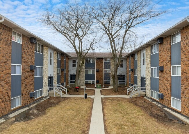 Building Photo - First Flats