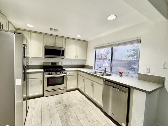 Kitchen with Stainless Steel Appliances - 1457 Homestead Ct