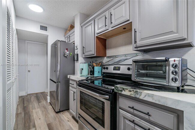 Building Photo - 3400 Blue Lake Dr