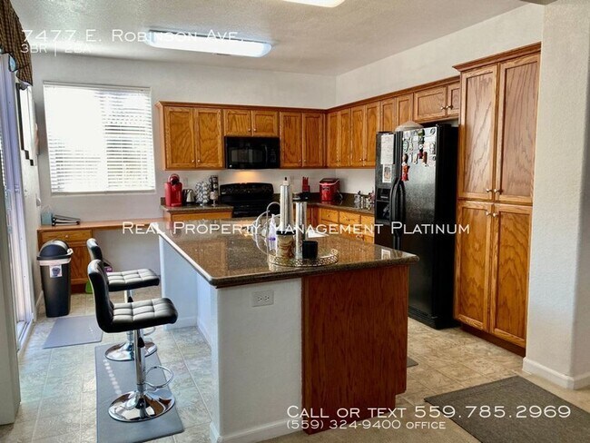 Foto del edificio - 7477 E Robinson Ave