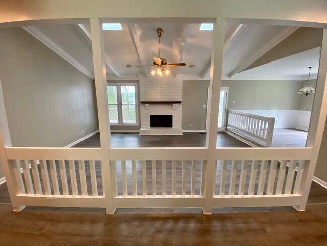 Living Room with Sky Lights and Fireplace - 2908 Jimamie Ln