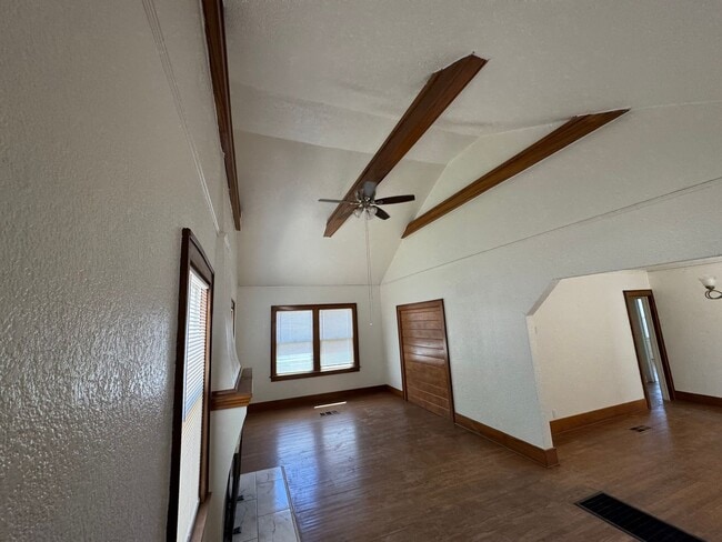 Building Photo - Beautiful hardwood floors throughout!