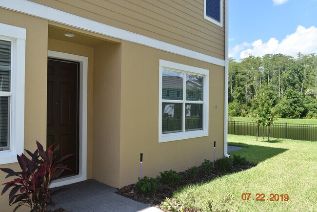 Building Photo - Corner Unit 3BD/2.5BA Townhome in Goldenrod Reserve in Orlando FL!