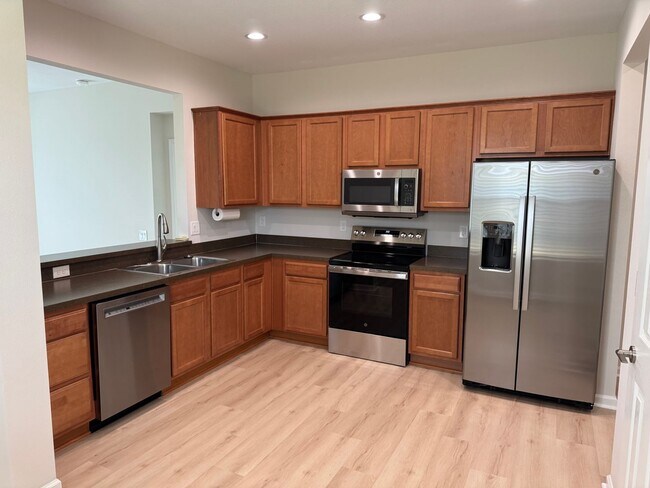 Building Photo - Luxury Living in Harrison Ranch – 3BR Lake...