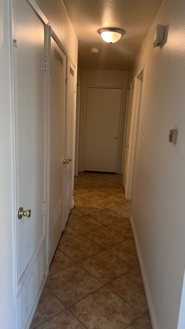 Building Photo - 3 Bedroom, Two Bathroom Condo