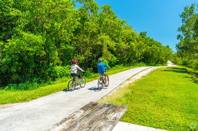 Take a bike ride or walk along the nature trails at Black Pointe Park and Marina.