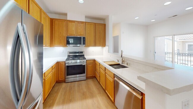 Foto del edificio - Modern 2BR/2BA Rancho Cucamonga Condo with 2 Balconies & 2-Car Garage – No Carpet!
